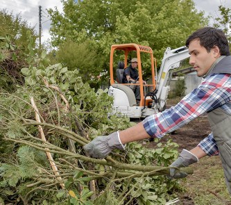 Man holding tree branch